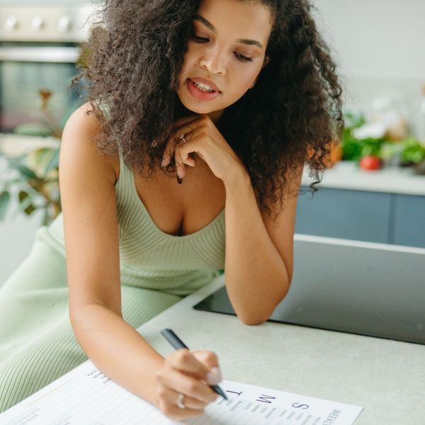 Woman making a plan for the week
