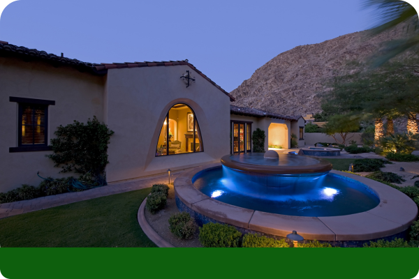 Residential backyard with a water fountain