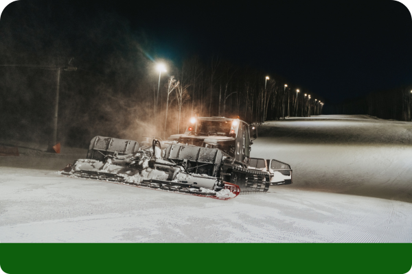 Truck plowing through snow