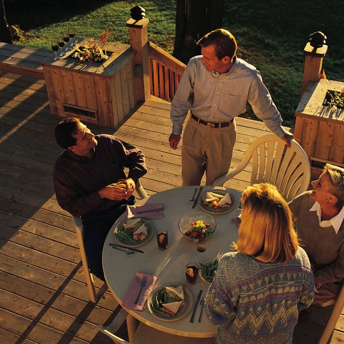 Friends having dinner on a deck