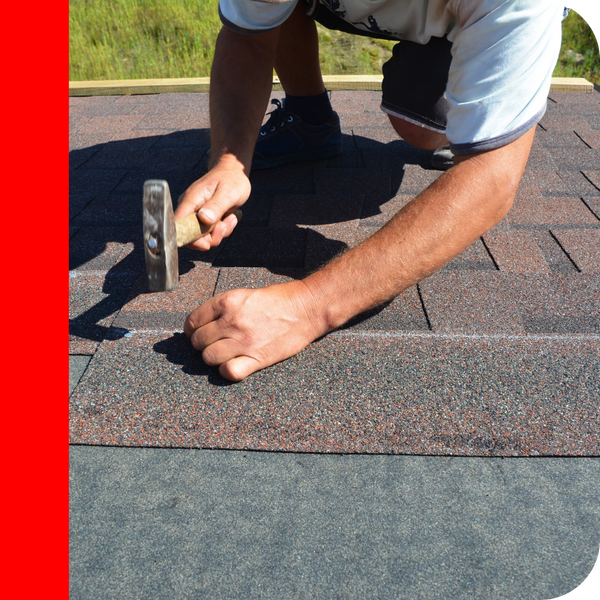 roofer hammering nails on roof roofer hammering nails on roof