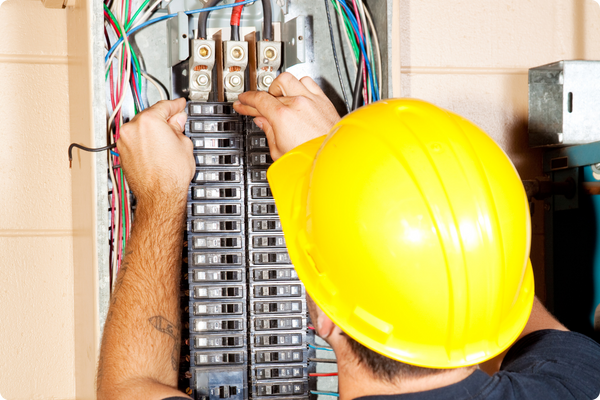Open view of a newly installed, organized electrical circuit breaker panel.