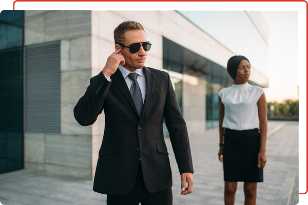 a bodyguard escorting his client