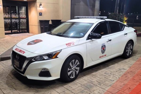 a white security patrol car