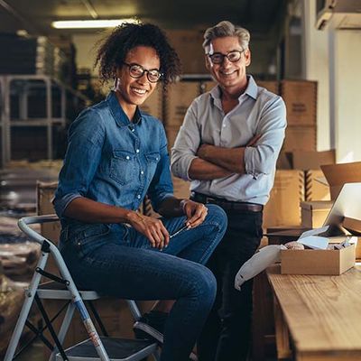 A picture of a company person and client talking, or of different plastic resins.