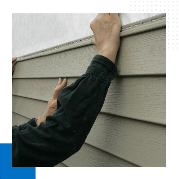 siding repair in progress
