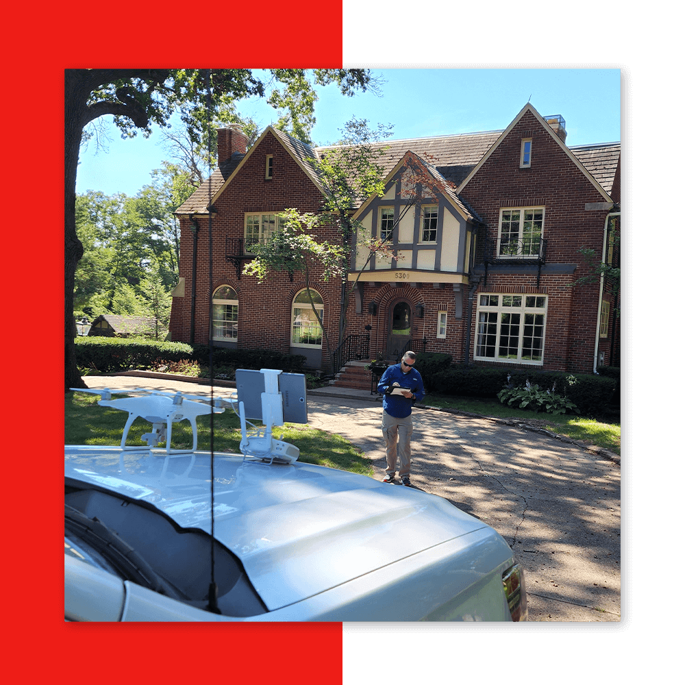 roofer with drone and clipboard writing down stats