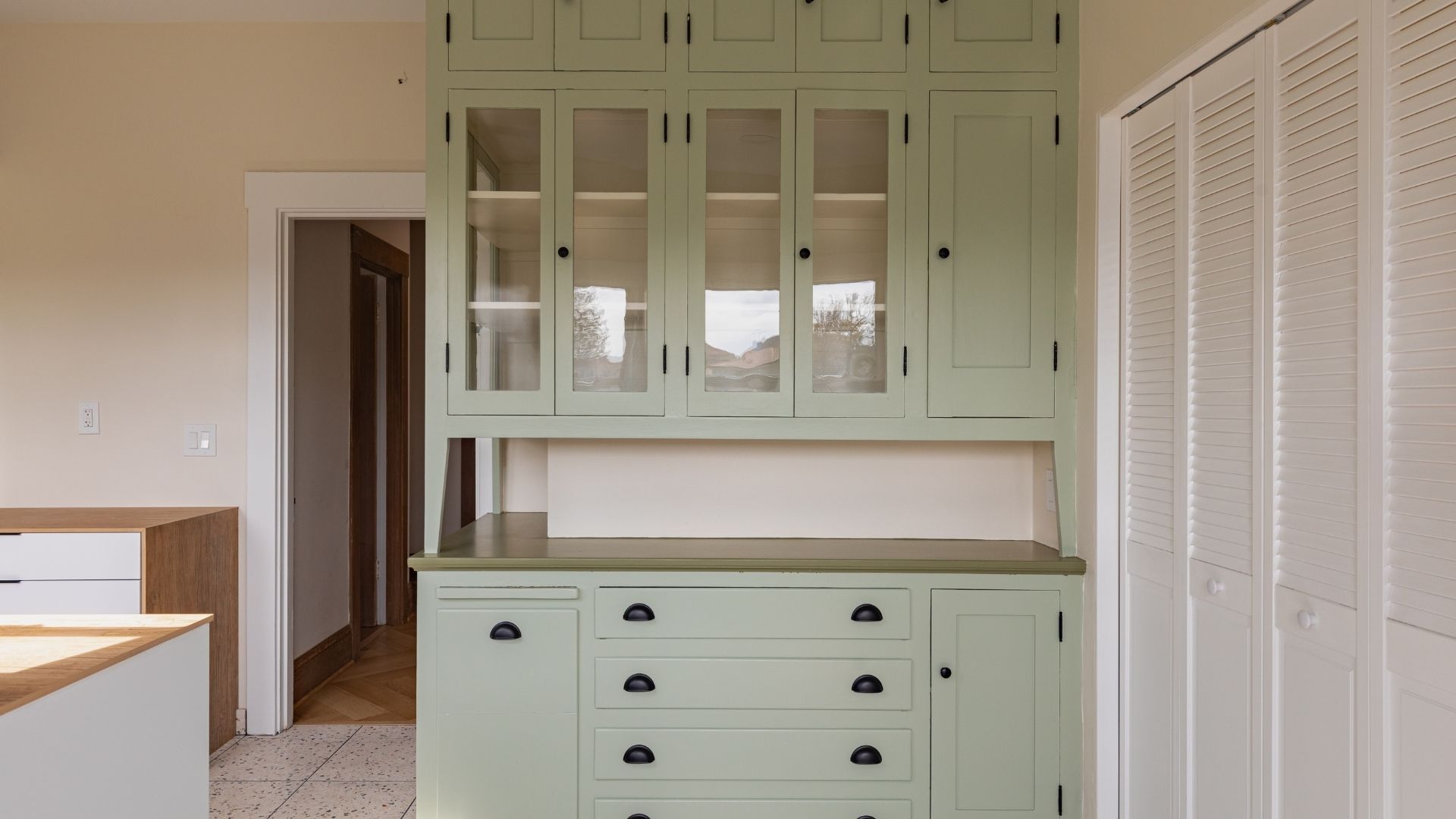 new green kitchen storage cabinetry