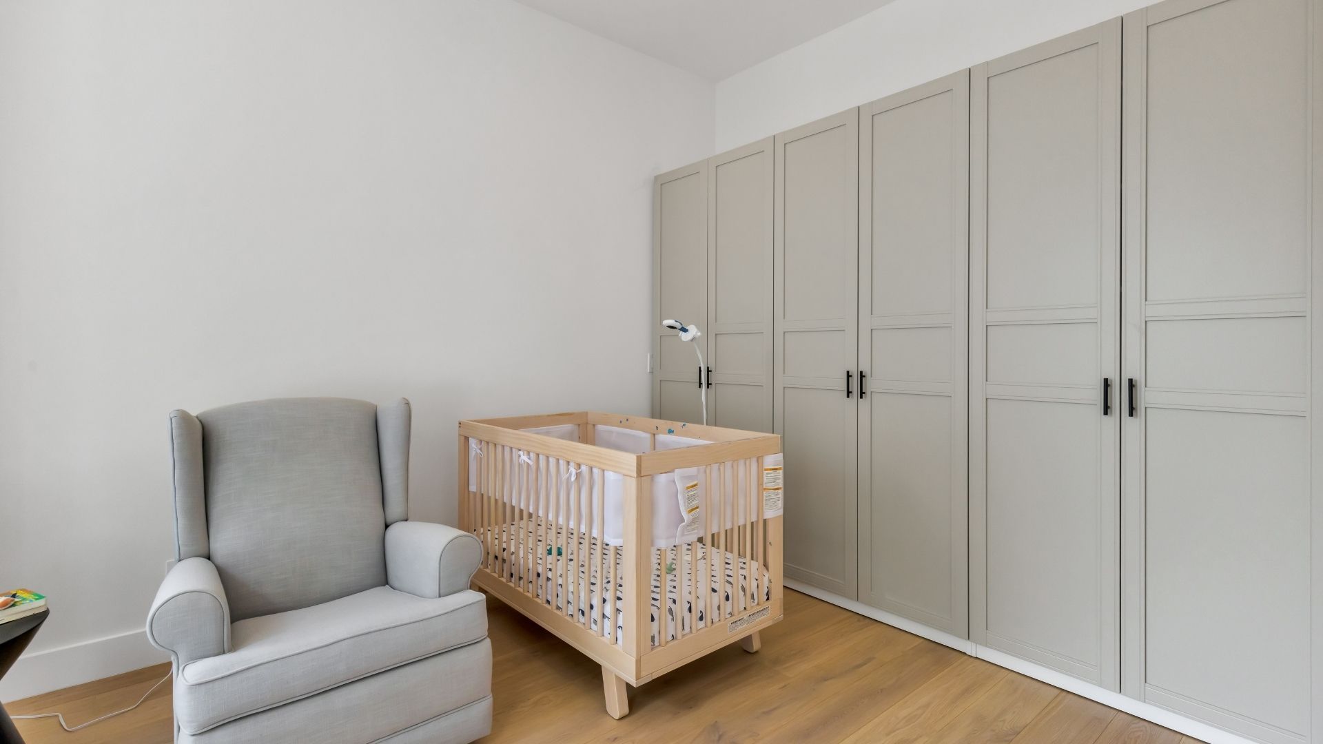remodeled nursery with wall of closets