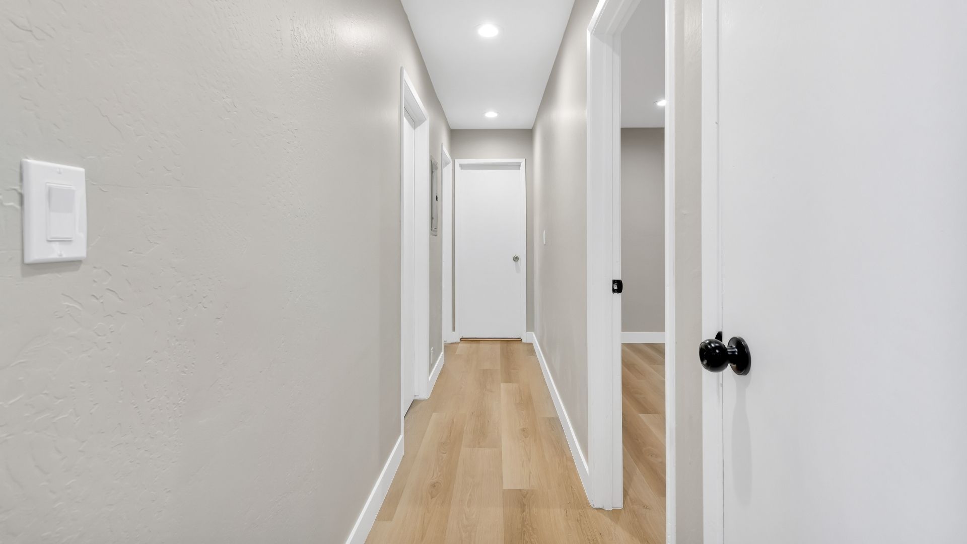 remodeled hallway with doors
