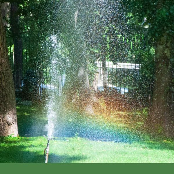 sprinkler system watering grass