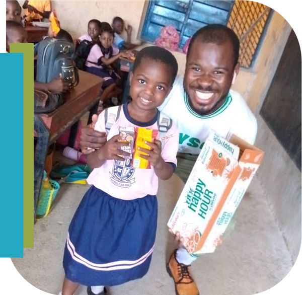 Nigerian man and little girl smiling 