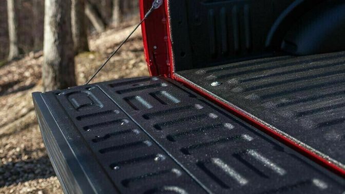 Red truck with a sprayed bedliner