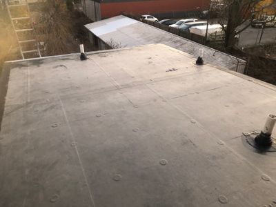 We repair and replace flat roofs too!