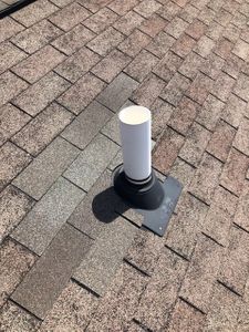 replaced shingles near pipe boot