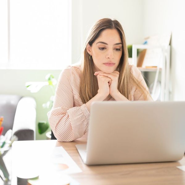 woman looking at computer