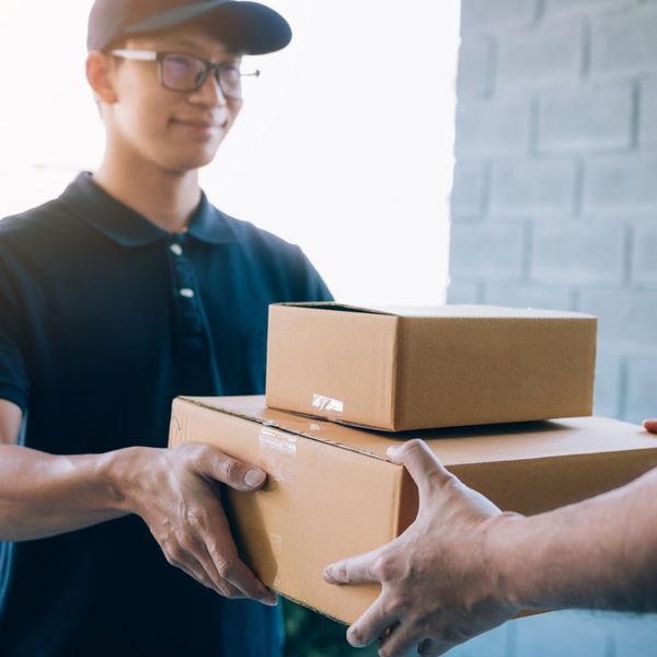 handing a driver boxes