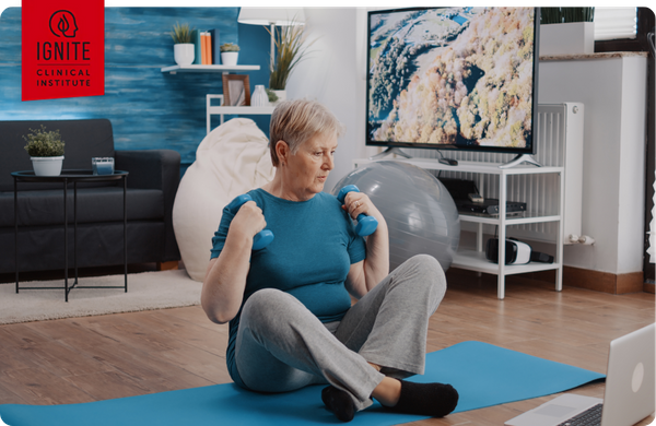 older woman lifting weights