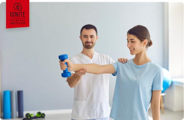 woman working with physical therapist