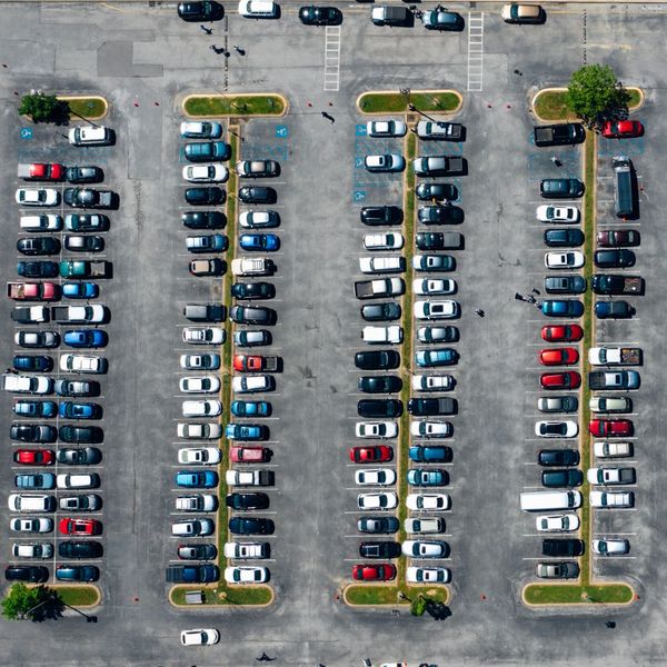 a busy and full parking lot