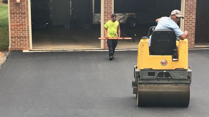Top Signs Your Asphalt Driveway Needs Repair hero.jpg