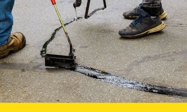 cracks in concrete being filled