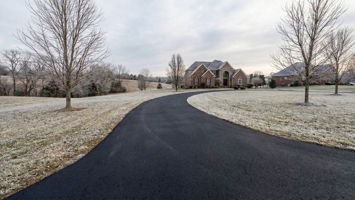 pristine asphalt driveway in winter