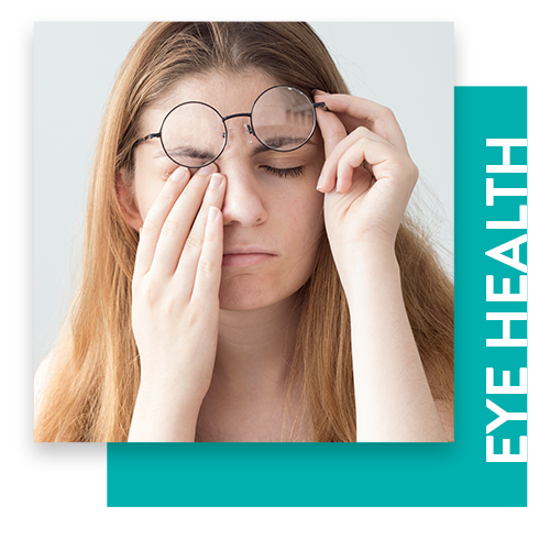 Photo of a woman rubbing her eye