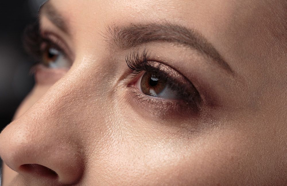 photo of a woman's eyes photo of a woman's eyes