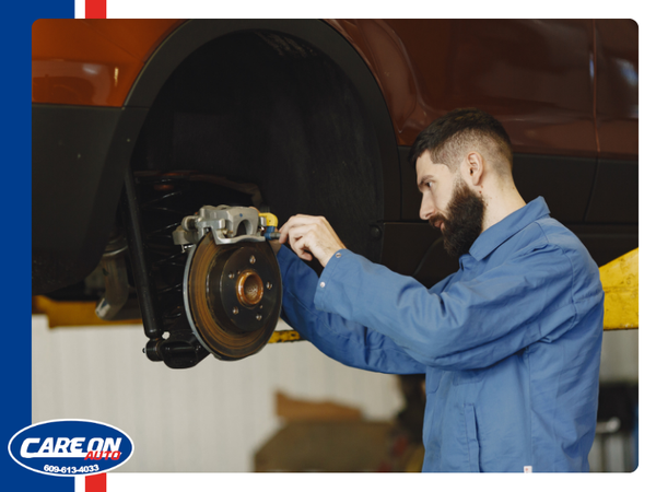 Mechanic completing a brake change