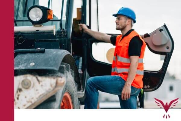 worker climbing into truck