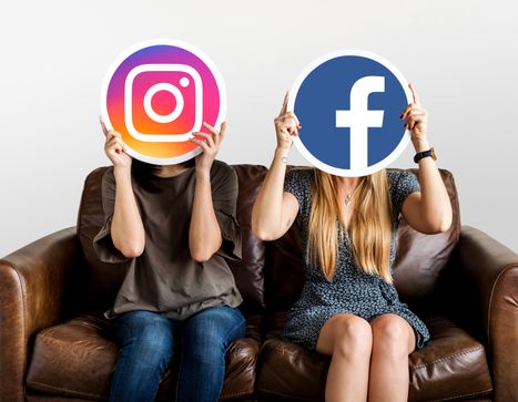 people-holding-social-media-icons.jpg