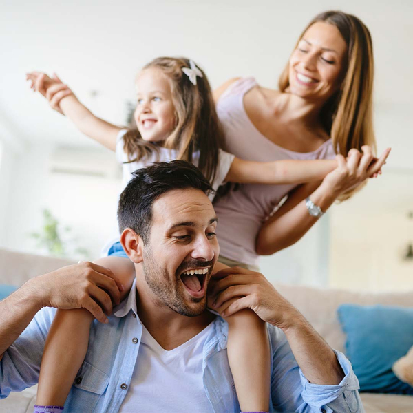 happy comfortable family on couch