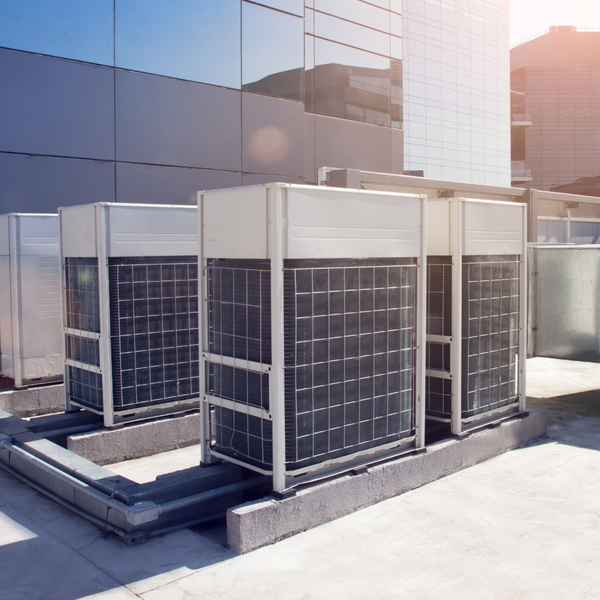 several large commercial AC units on roof