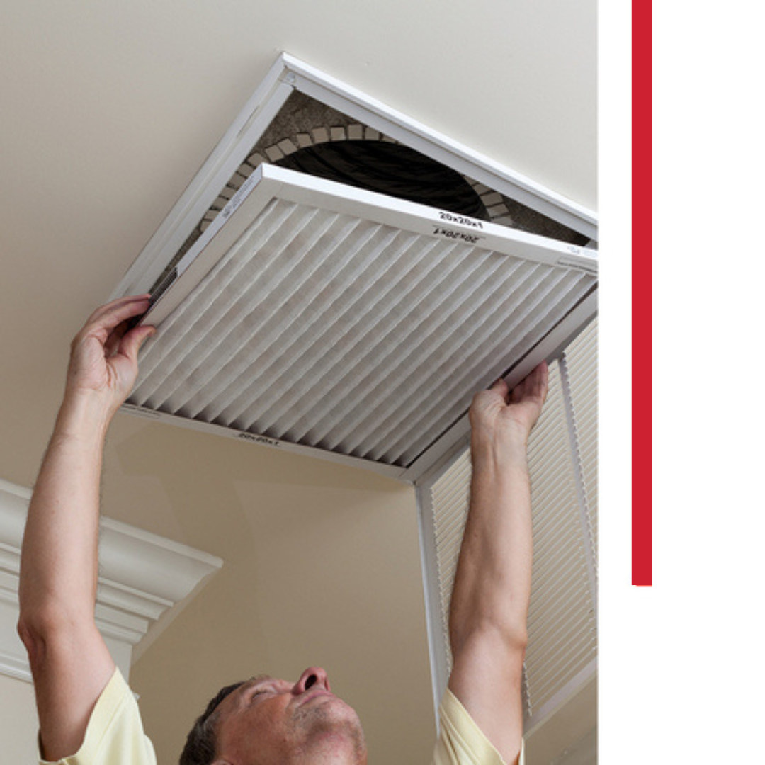HVAC tech changing air filter