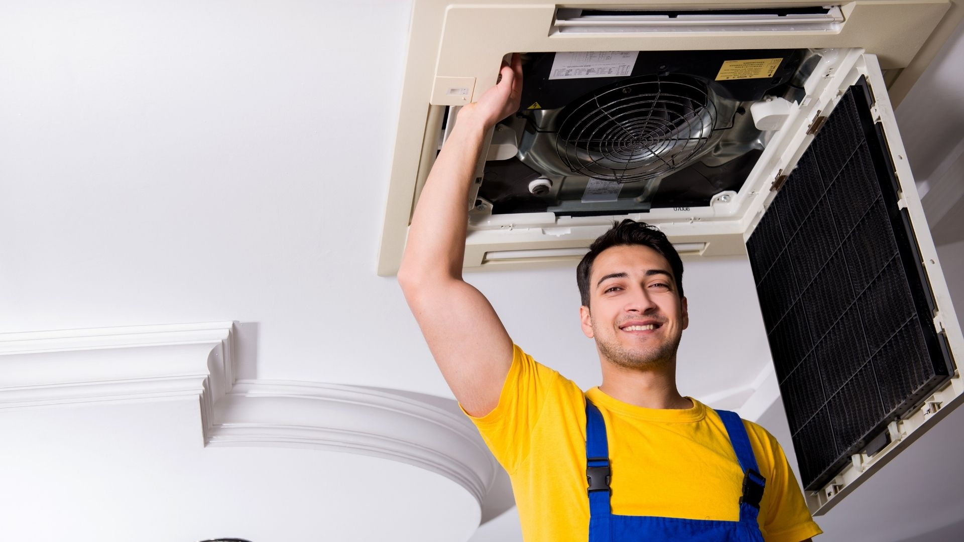 man working on HVAC system