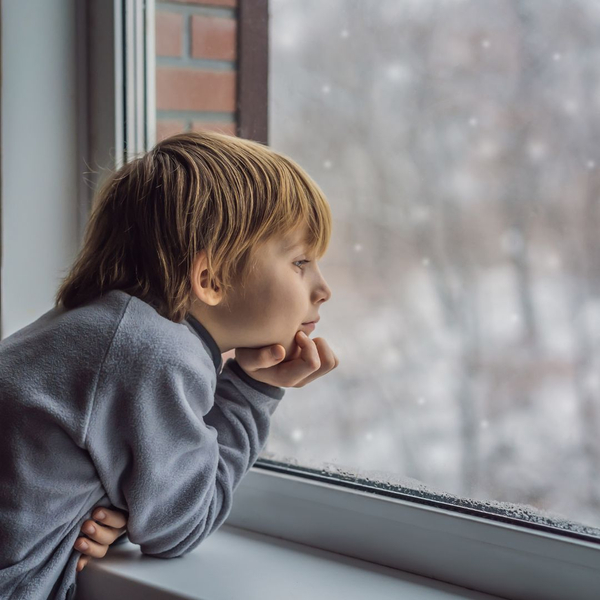 child at window