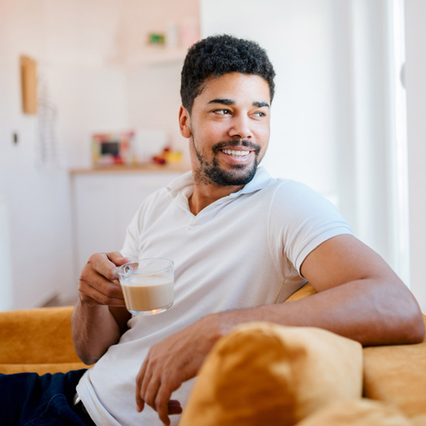 Man smiling with coffee
