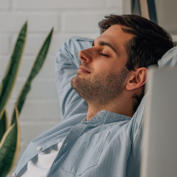 man breathing at home