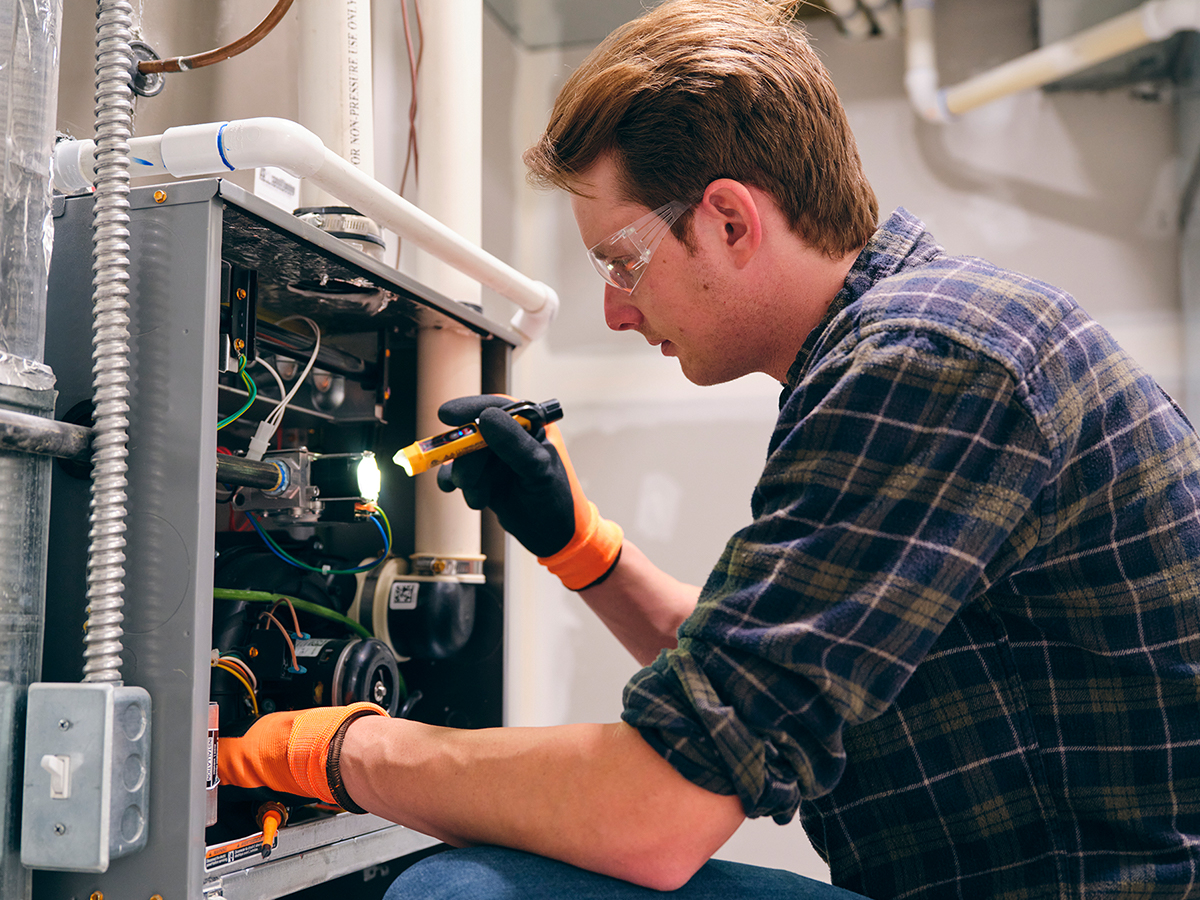 Man checking furnace