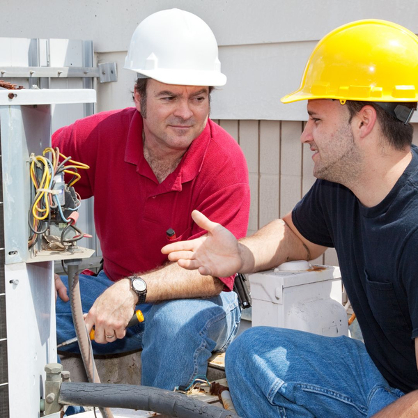 Two HVAC workers