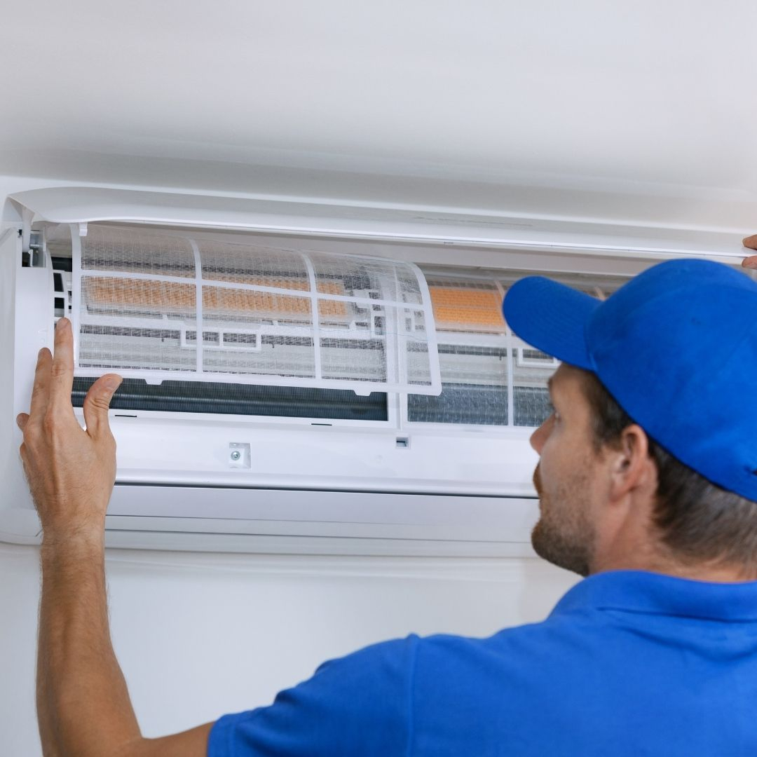 man working on an HVAC system