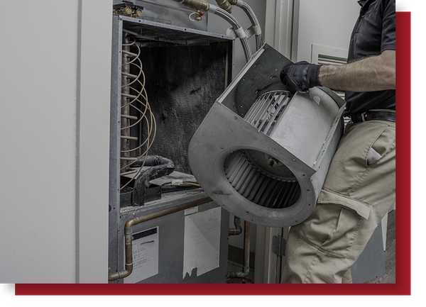 Technician working on furnace