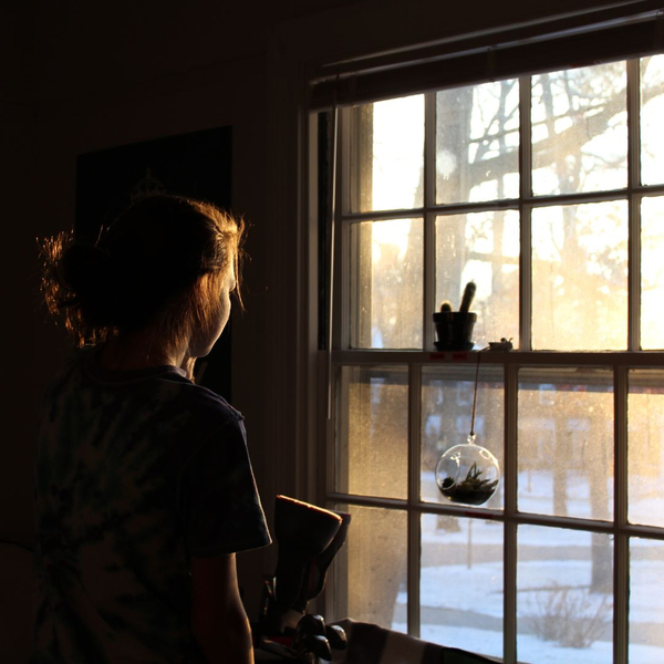 child at window