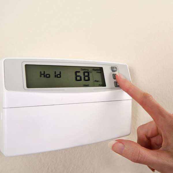 Pressing a thermostat