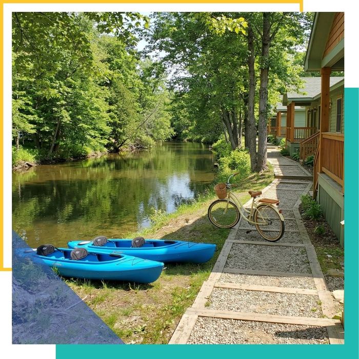Complimentary kayaks and a bicycle available for guest use at a Traverse City motel.