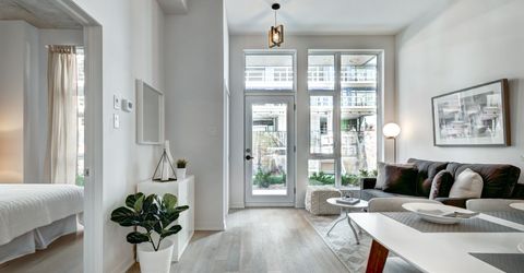 a clean white organized apartment