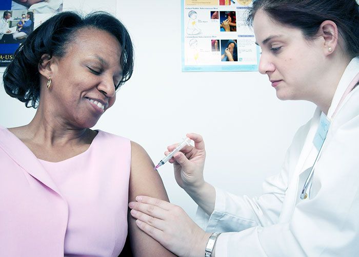 patient receiving covid vaccine