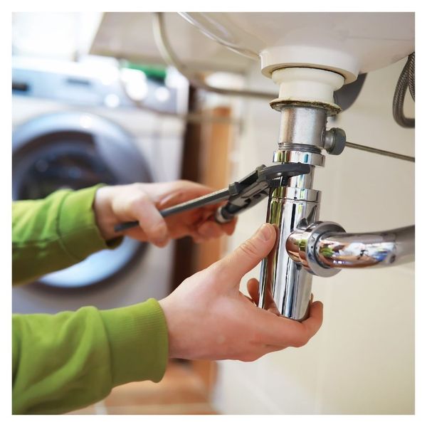 plumber in bathroom