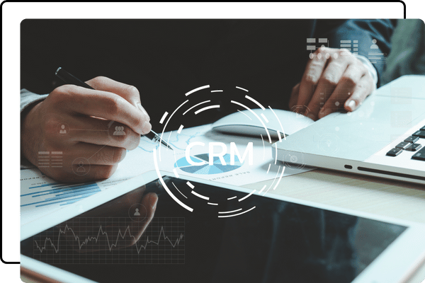 A person pointing at a laptop screen with a digital overlay showing the letters "CRM" (Customer Relationship Management) and a graph, representing digital strategy or data analysis. Export to Sheets A person pointing at a laptop screen with a digital overlay showing the letters "CRM" (Customer Relationship Management) and a graph, representing digital strategy or data analysis. Export to Sheets
